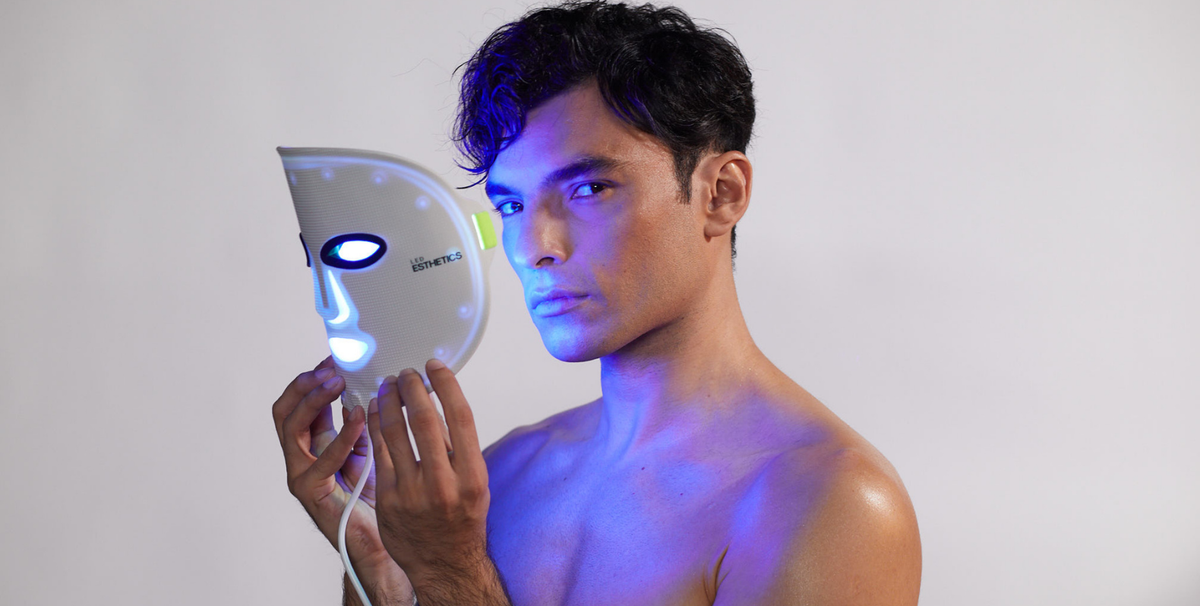 Glotech Mask Pro LED face mask with blue light therapy mode activated to target cystic acne-causing bacteria and reduce inflammation on acne-prone skin.