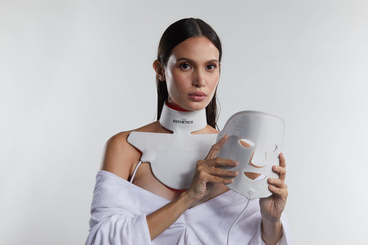woman holding face mask