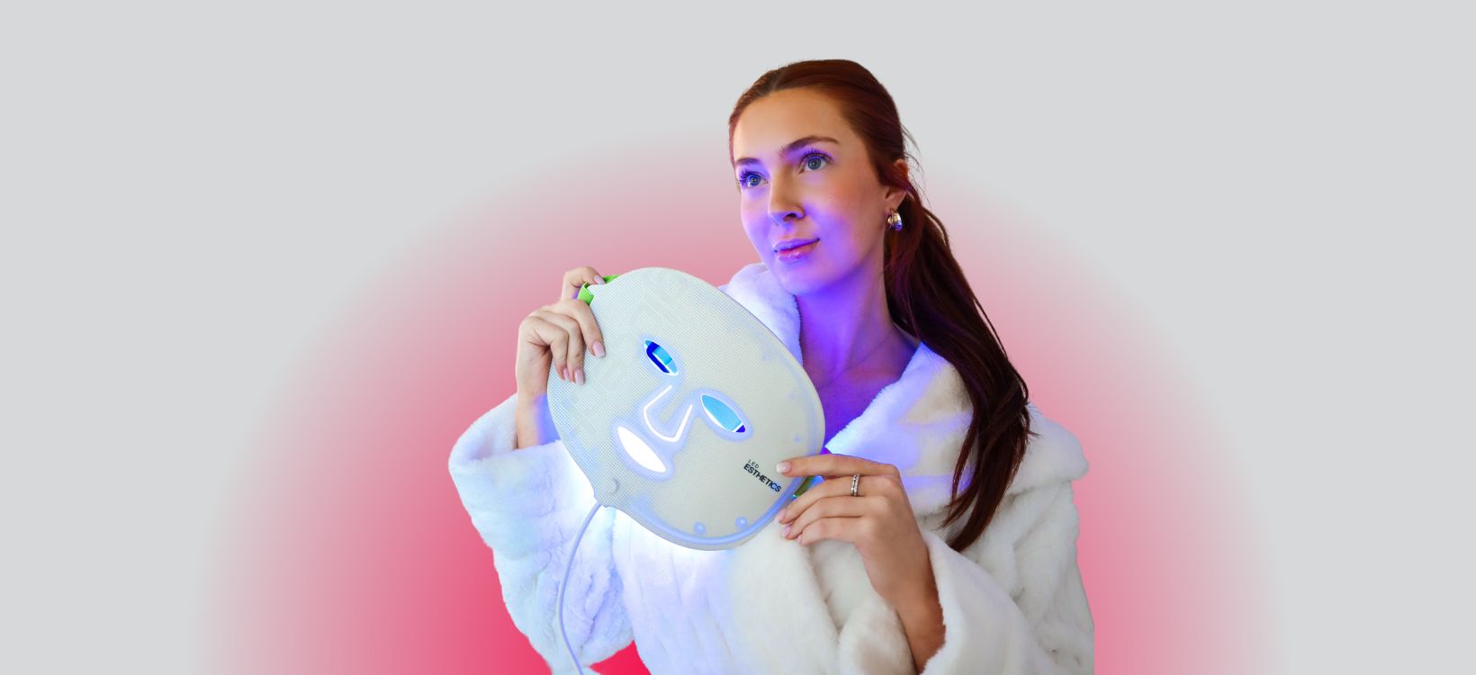 Woman using Glotech™ Pro LED Light Therapy Mask