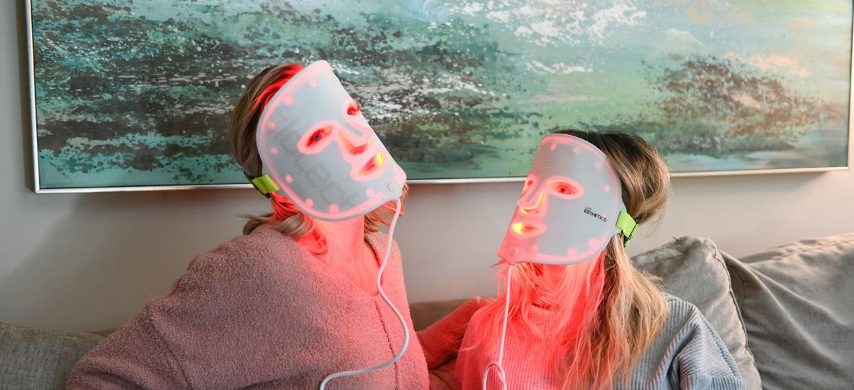 Women using LED light therapy masks for skincare treatment, red light facial therapy, beauty and wellness routine at home